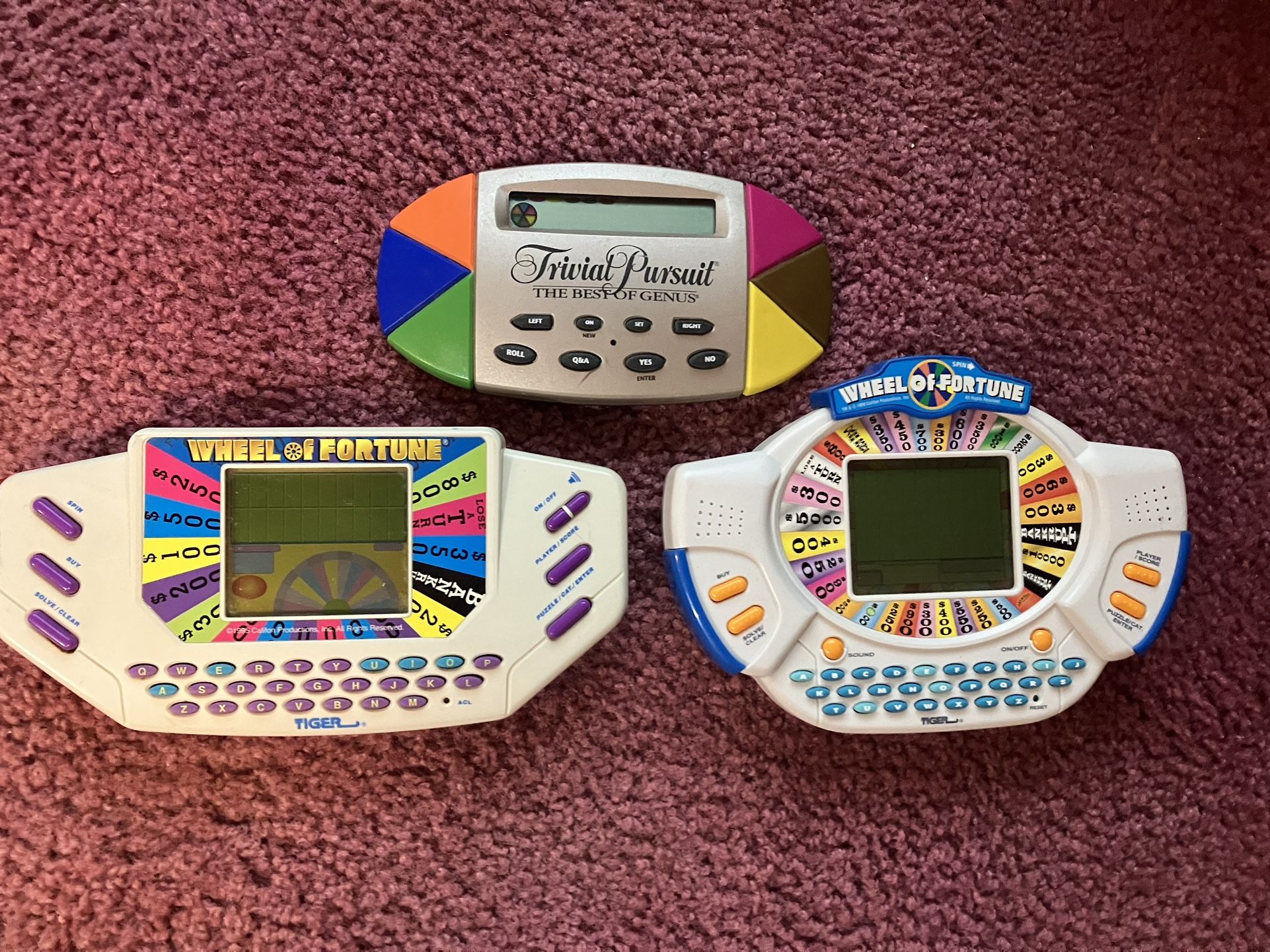 Two Wheel Of Fortune And One Trivial Pursuit Gaming Sustems