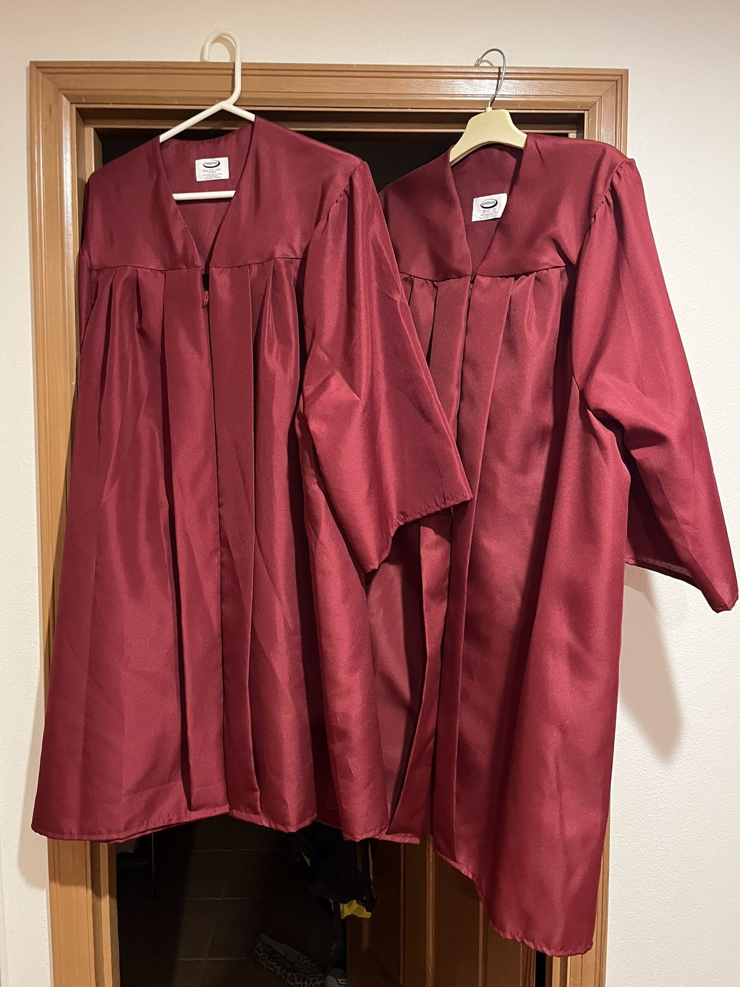 Two Graduation Gowns Colors Are CWU Or Eastlake HS