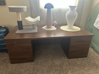 The solid wood table has drawers, and there are 4 of legs