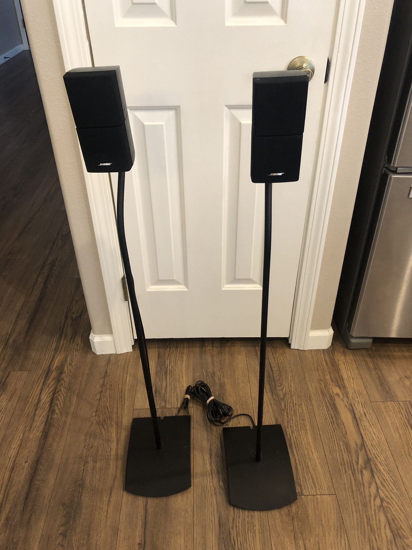 2 bose cube speakers with stands