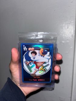 Luffy X Dodgers Card!! Fully Sealed with penny and hard sleeve