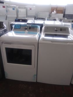 NEW scratch and dent GE top load washer and dryer set