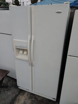 Whirlpool white side by side refrigerator