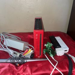 Red Nintendo Wii With 3 Controllers 