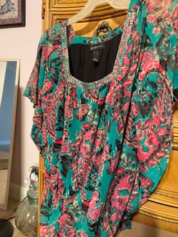Woman’s Scoop Neck Blouse