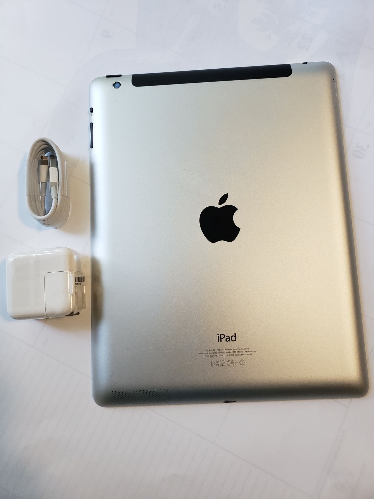 iPad 4th generation, works with wifi. comes with charger.