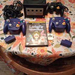 Nintendo Game Cube. 1 Regular Controller, 2 Wireless Controllers, Luigi's Mansion Game And Memory Card