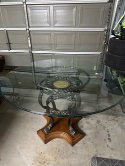 Dining table with glass top.