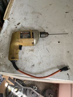 Reversing power drill