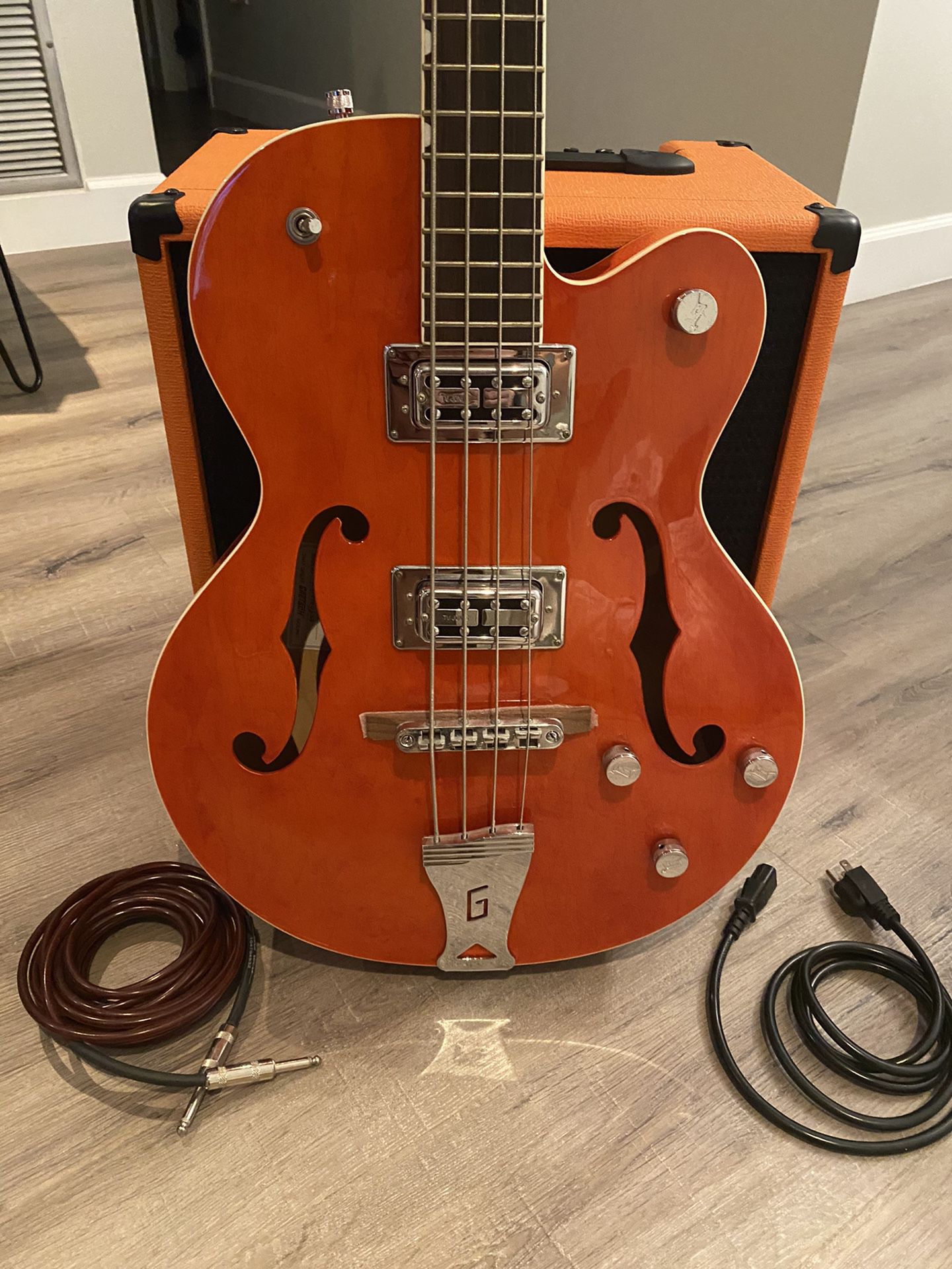 Gretsch Electromatic Bass Guitar and Orange bass amp.