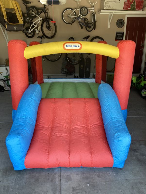 little tikes bounce house with slide and basketball hoop