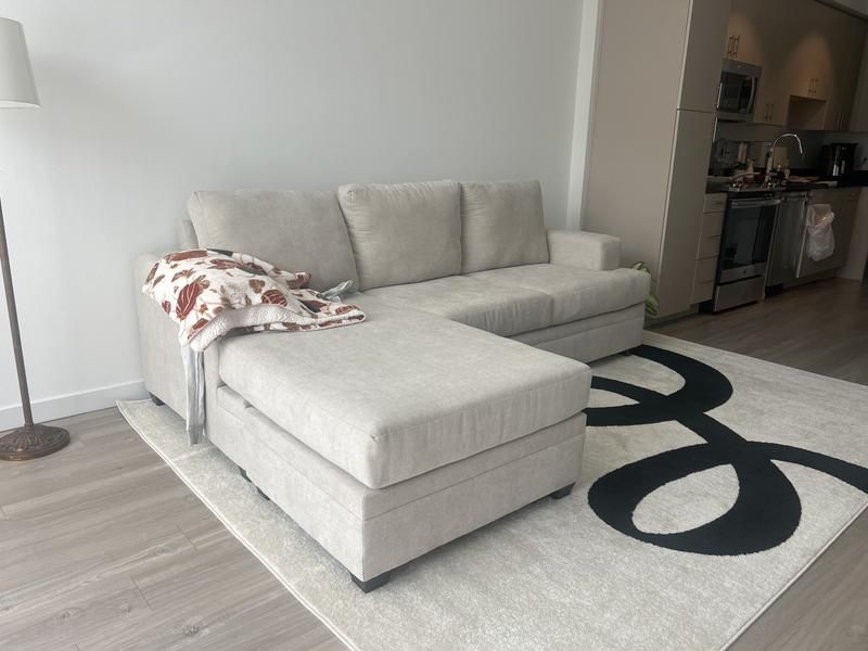 Living Spaces Sectional ( Delivery Available )
