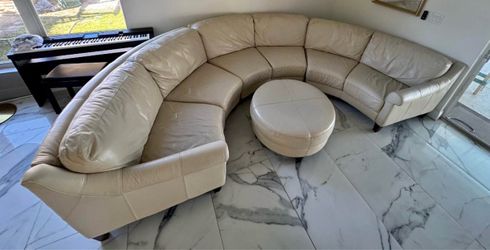 Leather sectional couch with ottoman