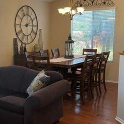 Dining Table And 8 Chairs (New Condition) 