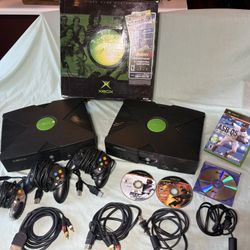 Two Original Xbox’s And Games Bundle W/ Controllers
