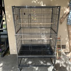 LARGE BIRD CAGE WITH SWING AND PLATES
