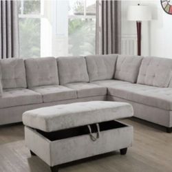 New Gray Chenille/Corduroy Sectional Sofa With Ottoman. New In Original Boxes