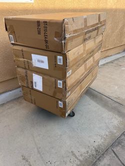 4 New Boss leather Sled  Base side Chair /w Arms asking $50 Each