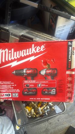 Milwaukee M18 18V Lithium-lon Cordless Drill Driver/Impact Driver Combo Kit (2- Tool) W/ Two 1.5Ah Batteries, Charger Tool Bag Store SKU# 233-545