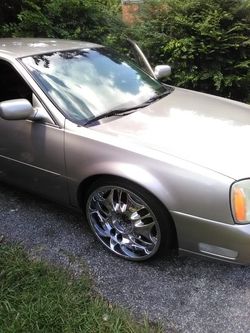 04 Cadillac d .bolted or 22 clean car