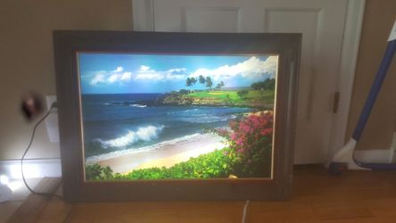 Picture with sounds of waves and birds chirping