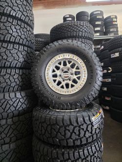 17" KMC w/ 33" RT tires. $1800