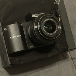 Samsung NX1000 20.3 Megapixel Mirrorless Camera (Body with Lens Kit) - 20 mm - 50 mm Black Wifi 32gb Memory 1080p Video