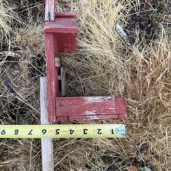 Tall wooden red Birdfeeder On Tall Post 