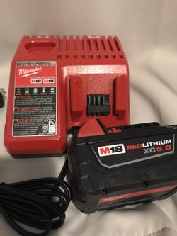 Milwaukee M18 Battery 5.0ah And Charger Brand New