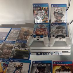 PlayStation 4 Like New ‘ 18 Games & 2 Remotes. 