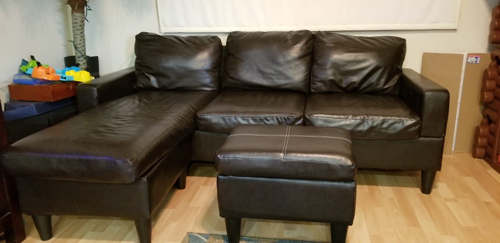 Dark espresso couch/sectional with ottoman