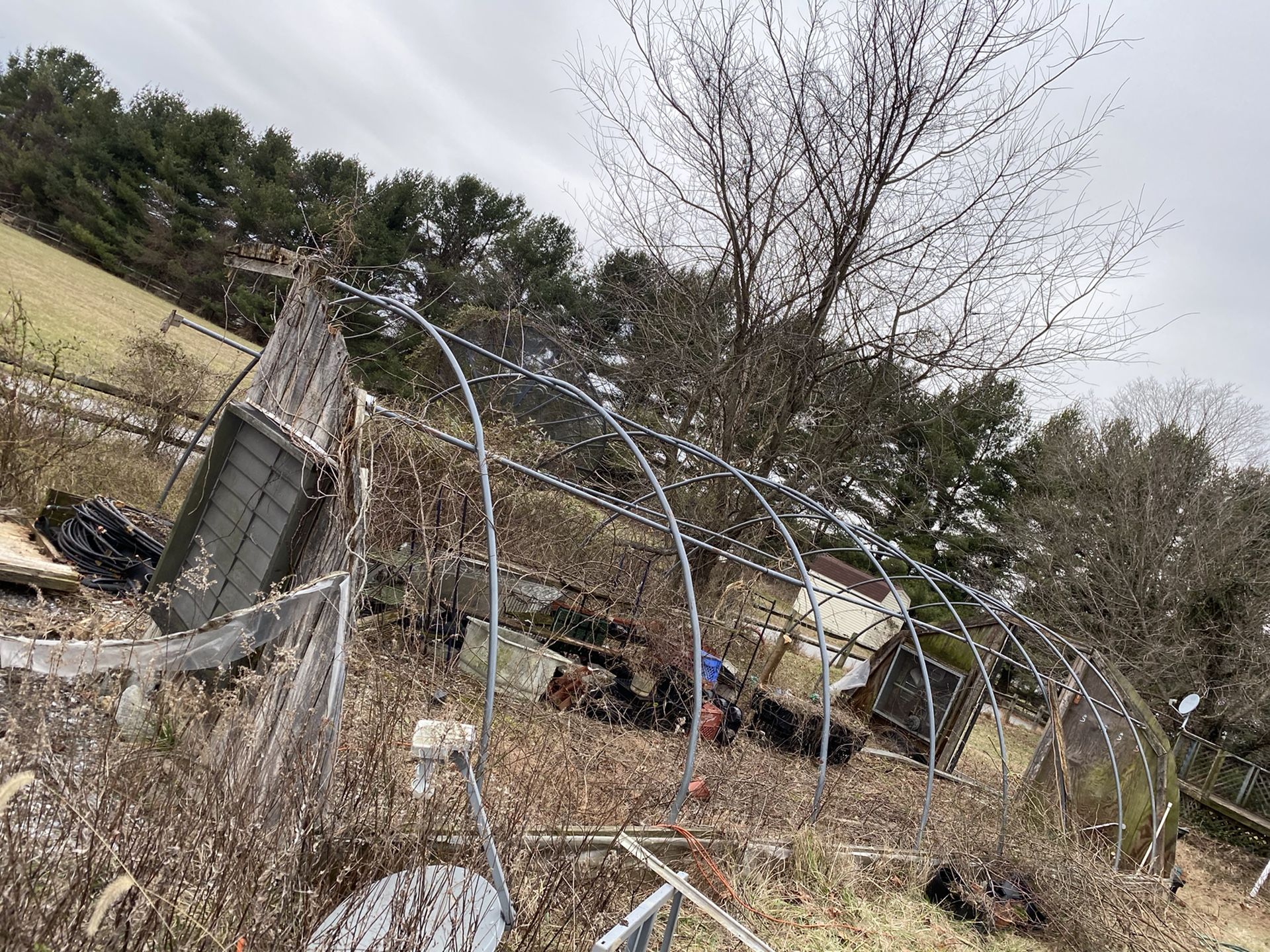 Greenhouse frame, vent, and fan