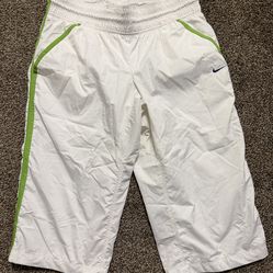 Vintage Nike Dri-FIT Mesh-Lined Capri Track Pants White Green Stripes Women’s M  Perfect for running, gym, or casual athleisure when you want somethin