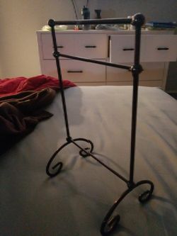 Rubbed bronze metal hand towel holder