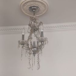 2 beautiful crystal chandeliers