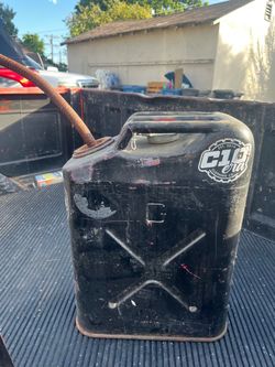 Vintage Jerry gas can with base