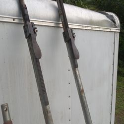 2 Upright Jack's Used For Holding Whatever Over Your Head Up
