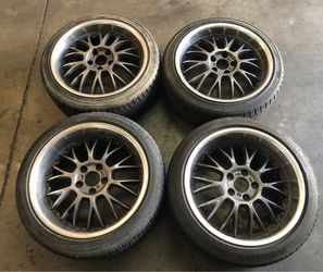 Used 18x8.5 +35 and 18x9.5 + 45 staggered mesh wheels with tires (5x114.3)