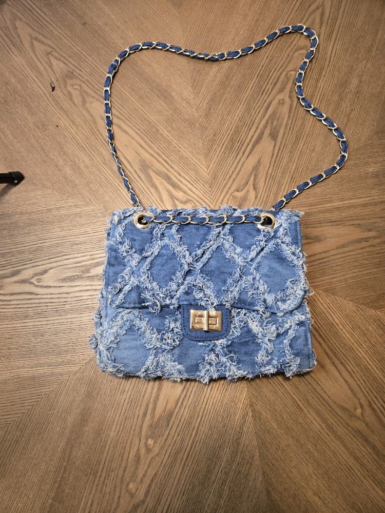 MKP Collection or M Marco small quilted distressed denim crossbody bag
