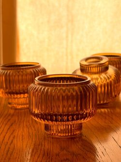 Amber glass candle holder