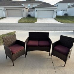  Selling wicker furniture set with cushions.