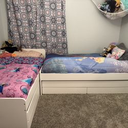 Two IKEA Twin Bed Frames with two Trundles and one trundle mattress 