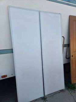 Closet doors with track