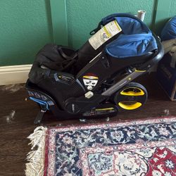 Doona Car seat/Stroller With Two Bases