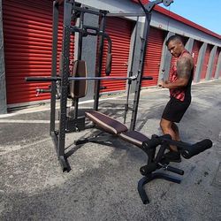 $1000 Home Gym Power Rack Smith Machine + Reclynable Bench+240 Pounds&Libras & Plates Set.   45s pair Olympic  25s pair Standard & 1inches Hold 25s pa