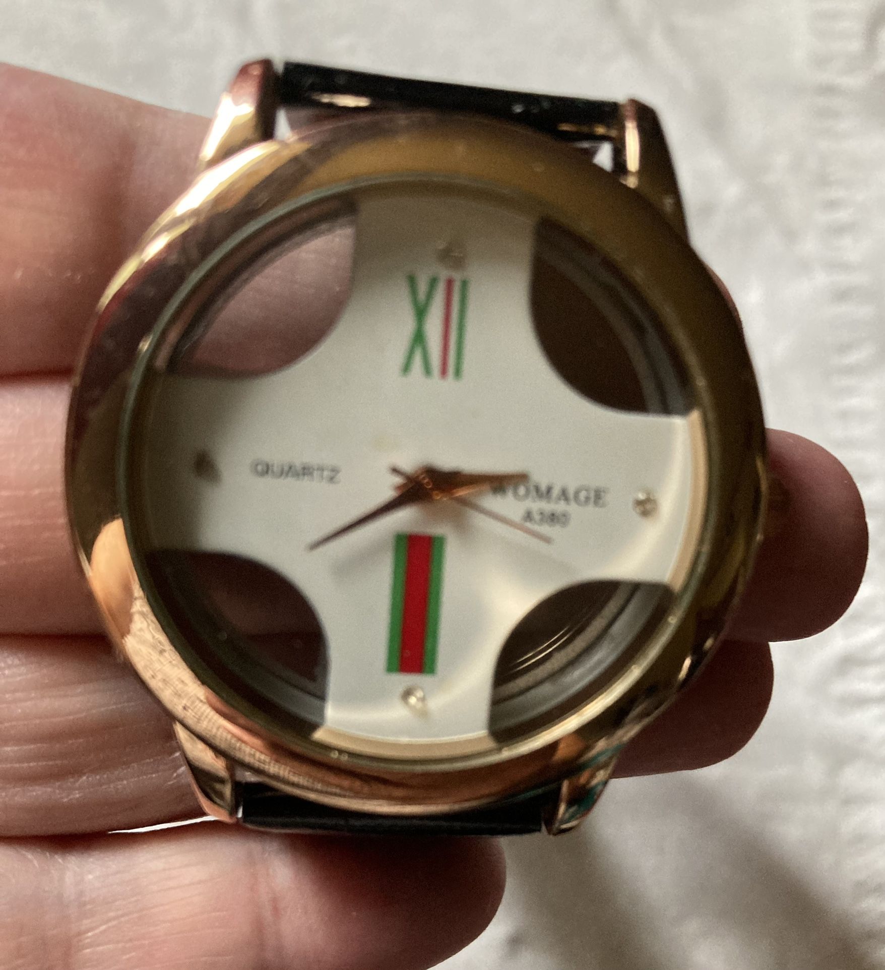 MENS WOMAGE QUARTZ PEEK-A-BOO WRISTWATCH