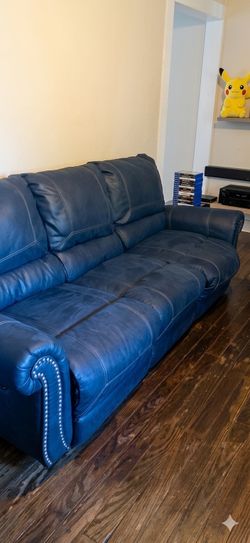 Beautiful leather couch with love seat recliner used