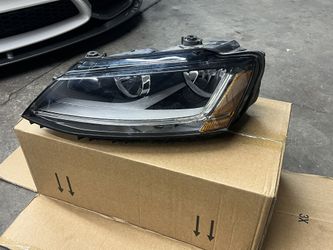 Driver Side Headlight VW / Volkswagen Jetta  