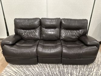 Genuine leather power reclining sofa with flipdown center console by Flexsteel
