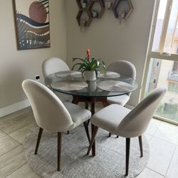 Four Light Gray Upholstered Dining Chairs